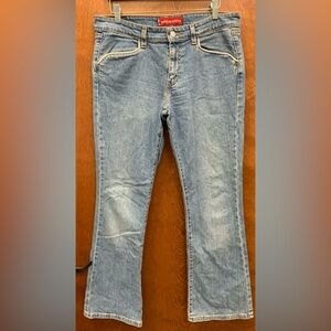 Y2K Levi rare super low rise stretch jeans with white piping size 11